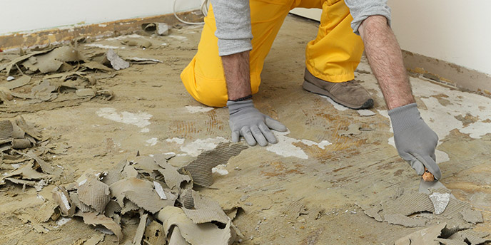 scraping-floor-adhesive